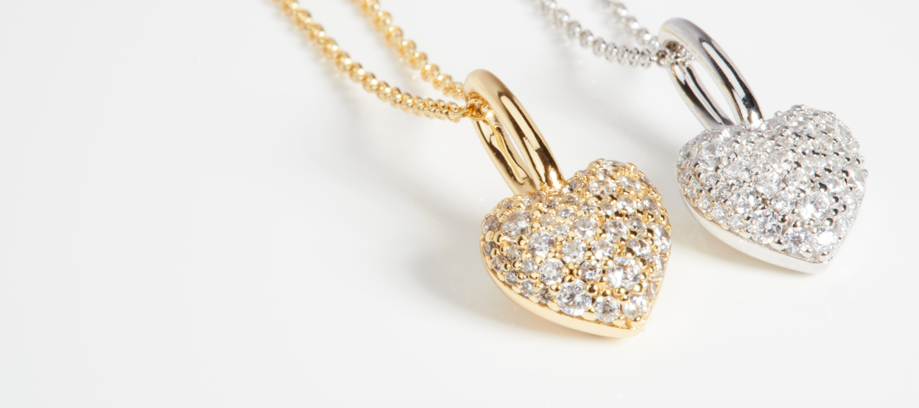 hjertesmykker i sølv og guld
