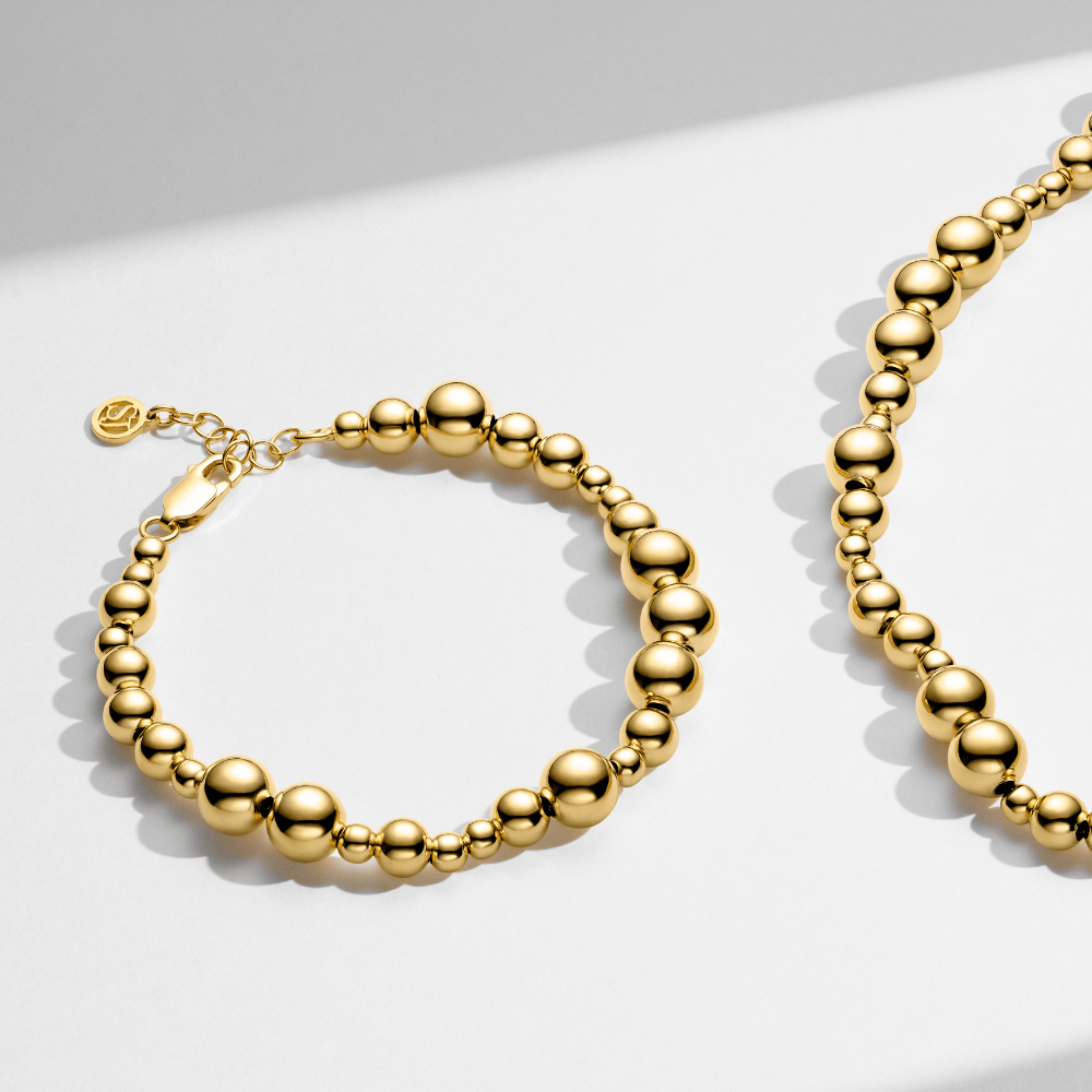 statement armbånd i guld