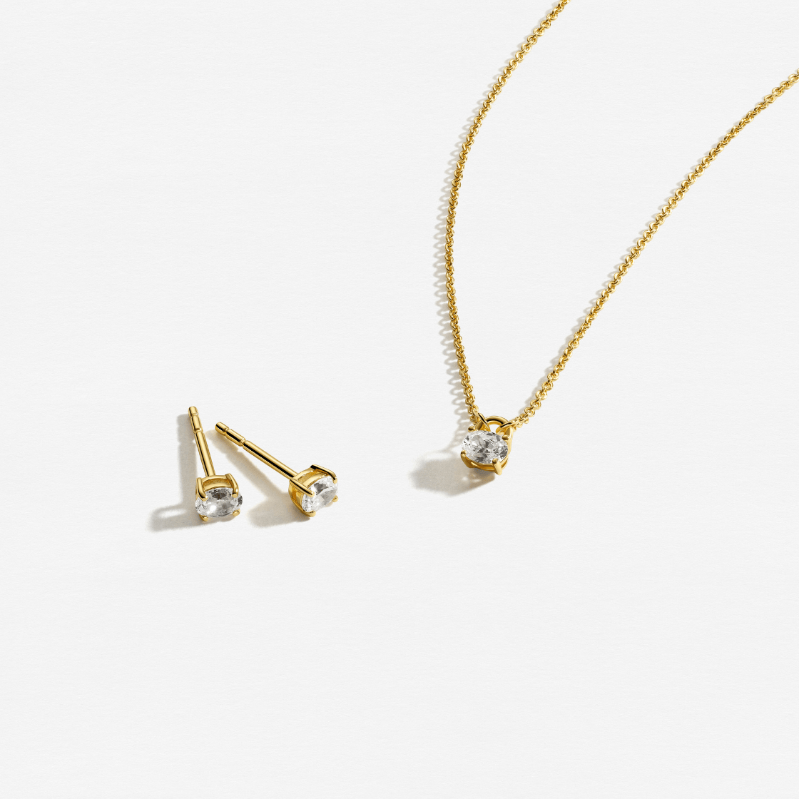 Sif Jakobs Smykkesæt Essenza ovale sæt med halskæde og øreringe - forgyldt SJ-E-S2744-CZ-YG